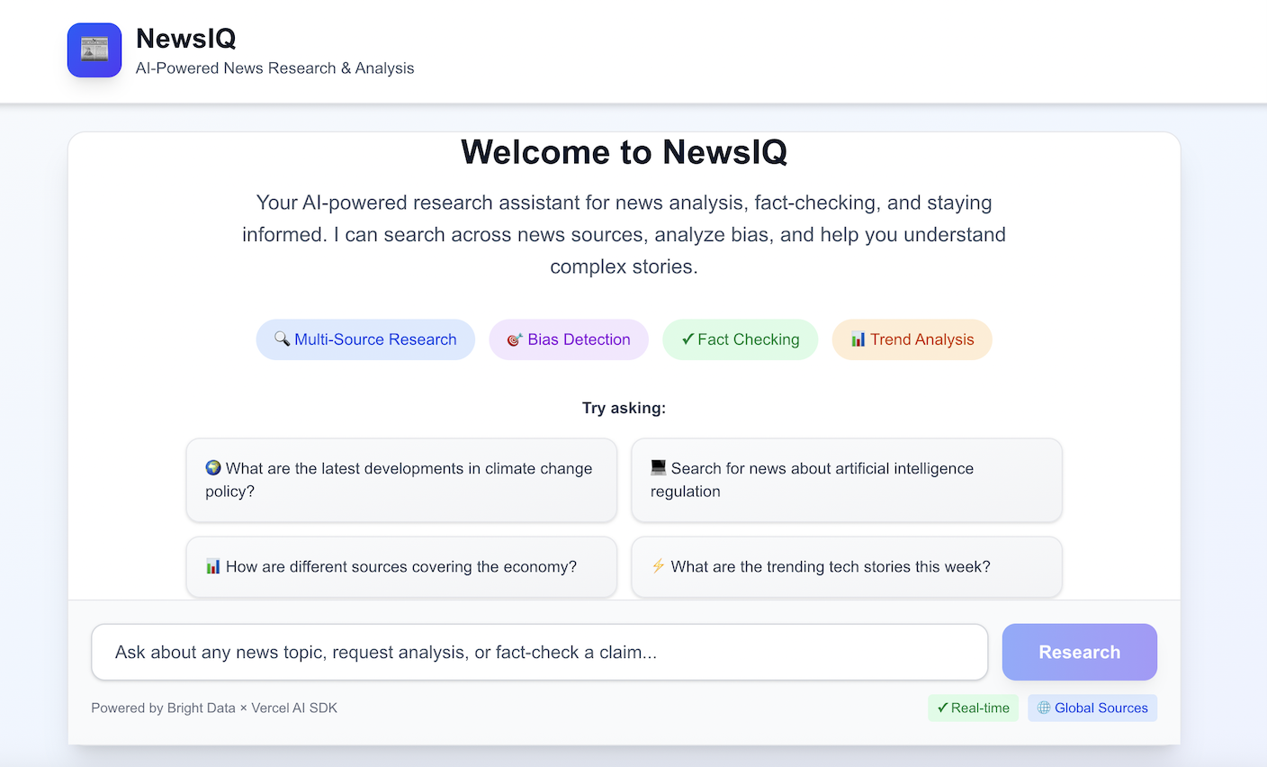 Screenshot of NewsIQ welcome screen with example queries